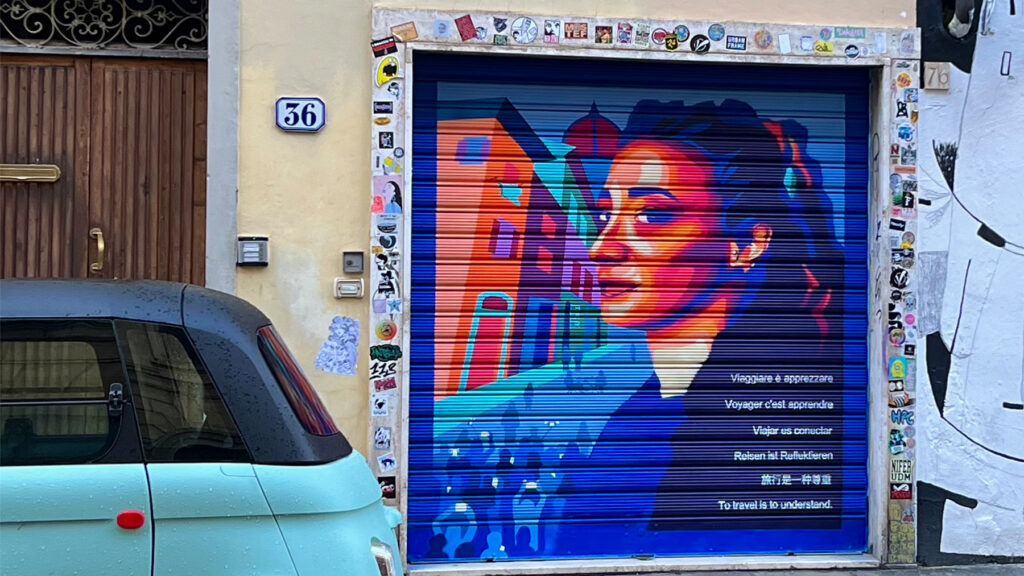 Photo: Allison Seanor's mural "To Travel is to Understand" was created as part of Florence, Italy’s annual Palazzuolo Strada Aperta festival. / Allison Seanor