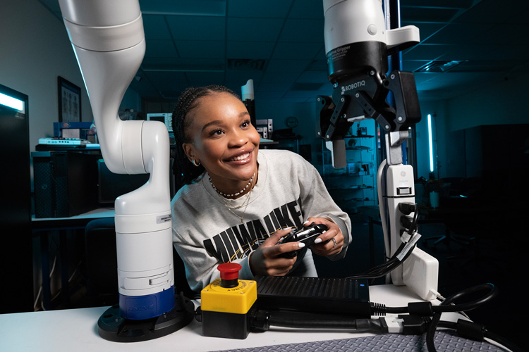 Photo of UWM student Georgina Monese, who is pursuing her bachelor's in biomedical engineering, driven to use new technology to help people and improve medicine. (UWM Photo/Troye Fox)