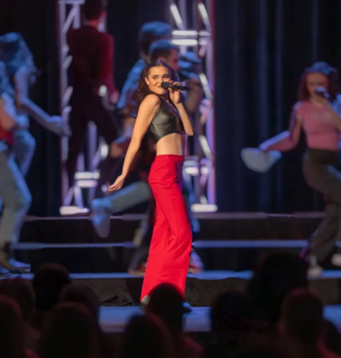 Photo: Lewis took part in the annual Cabaret production each January, one of the biggest and longest-standing, student-run music and theatre arts endeavors on campus. She is pictured here in the 2024 show, "On the Silver Screen."