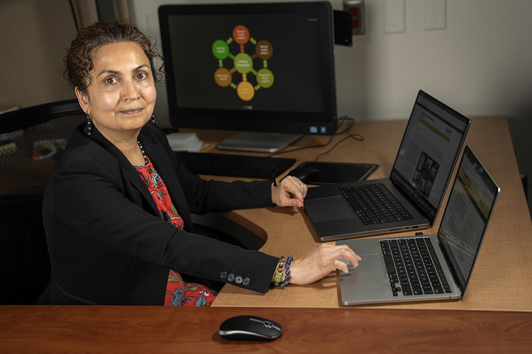 Photo: Priya Nambisan, associate professor of health care informatics at UWM, says that tracking and monitoring is a key to maintaining good health. “Mentally, keeping track doesn’t work. Your brain cheats, and it’s too much information to keep in your head.” (UWM Photo/Andy Manis)