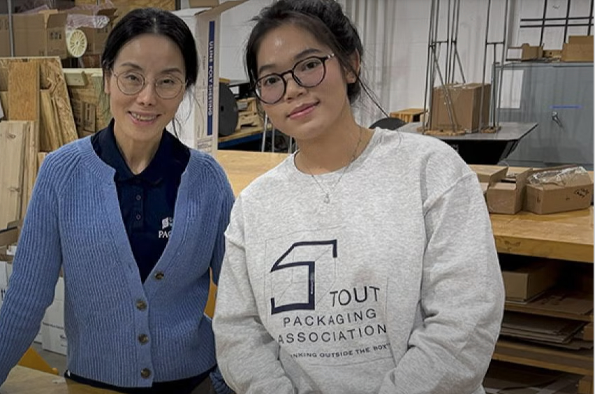 Photo: UW-Stout Assistant Professor Kate Liu, left, and her lab assistant, sophomore Claire Le, pose with materials in the packaging lab.