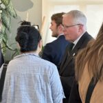 Participants conversing at the May 1, 2025, Shared Governance Council reception at Brittingham House in Madison, Wisconsin.