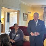 Participants conversing at the May 1, 2025, Shared Governance Council reception at Brittingham House in Madison, Wisconsin.