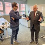 Universities of Wisconsin participants conversing at the May 2, 2025, Shared Governance Council meeting at the Pyle Center in Madison, Wisconsin.