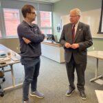 Universities of Wisconsin participants conversing at the May 2, 2025, Shared Governance Council meeting at the Pyle Center in Madison, Wisconsin.