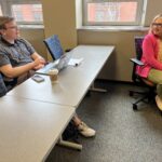Universities of Wisconsin participants conversing at the May 2, 2025, Shared Governance Council meeting at the Pyle Center in Madison, Wisconsin.