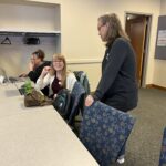 Universities of Wisconsin participants conversing at the May 2, 2025, Shared Governance Council meeting at the Pyle Center in Madison, Wisconsin.