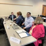 Universities of Wisconsin participants conversing at the May 2, 2025, Shared Governance Council meeting at the Pyle Center in Madison, Wisconsin.