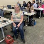 Diane Waters of the Universities of Wisconsin Administration smiling at the May 2, 2025, Shared Governance Council meeting at the Pyle Center in Madison, Wisconsin.