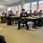 Universities of Wisconsin participants listening as one asks a question at the May 2, 2025, Shared Governance Council meeting at the Pyle Center in Madison, Wisconsin.
