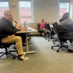 Universities of Wisconsin participants listening as one asks a question at the May 2, 2025, Shared Governance Council meeting at the Pyle Center in Madison, Wisconsin.
