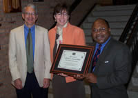 During the Regents meeting, Dr. Peter Gottlieb, representing the Wisconsin Historical Records Advisory Board and the Wisconsin Historical Society, presented the Governor’s Award for Archival Achievement to Laura Jacobs, archivist for the Lake Superior Maritime Collections Archives at UW-Superior's Jim Dan Hill Library. Displaying the award are, from left, Gottlieb, Jacobs, and Felix Unaeze, director of Jim Dan Hill Library.