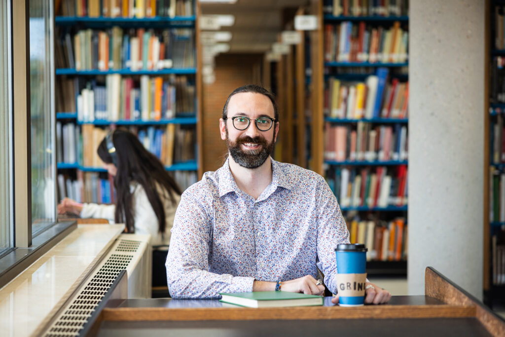 Photo of Scott Sutton, who dropped out of UWM twice. But he finally found his career path in the field of mental health, so he recently returned to pursue a degree in psychology. “It’s been a great fit, and I love it,” he said. (UWM Photo/Elora Hennessey)